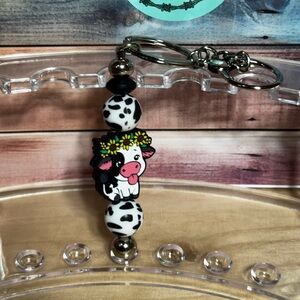 Cute Cow Keychain with Floral Accents